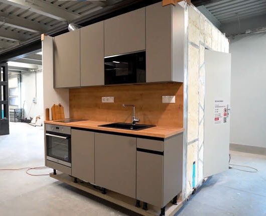 Kombinovaný prefabrikovaný koupelnový modul s kuchyňskou linkou pro YIT